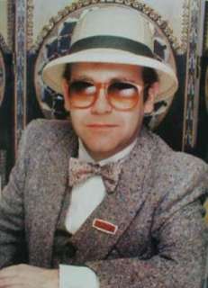   Elton both on and off stage. Includes a profile on Elton, and bios on