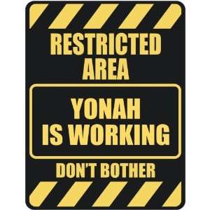   RESTRICTED AREA YONAH IS WORKING  PARKING SIGN