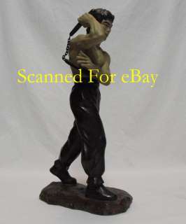 These rare ceramic statues were produced in the late 1970s, early 