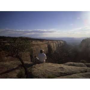  A Man Admires the View at Sunrise of the Canyon, Colorado 