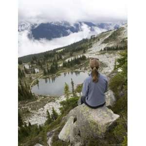  Woman Admires the View of the Clouds From High on a 