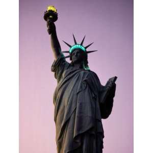  Twilight View of the Illuminated Statue of Liberty Premium 