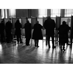  Standing Side By Side in Voting Booths, Filling Out Election Ballots 