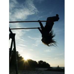  Girl Playing High on Swings at Sunset on Vosu Beach 