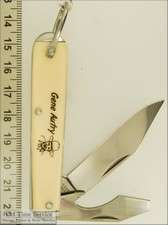 Gene Autry off white lucite & steel pocket knife fob  