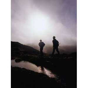  Walkers in Mist on Diamond Hill in Connemara National Park 