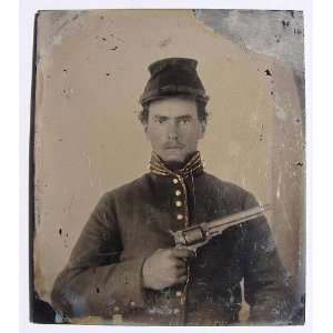   soldier in Union cavalry uniform with revolver
