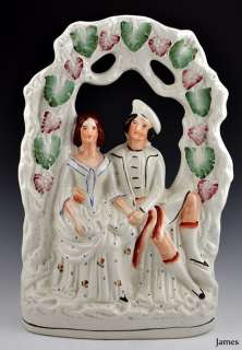Antique Staffordshire Seated Courting Couple Figurine  