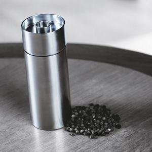   and pepper mill set by arne jacobsen for stelton