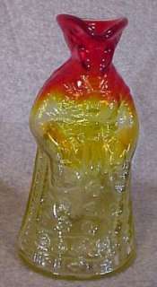 this is a stunning art glass syrup pitcher in beautiful red and yellow 
