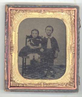 CIVIL WAR ERA TINTYPE OF A BOY AND A GIRL WITH A DOLL  