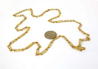 This is a long 18k gold solid link chain necklace. The piece is well 