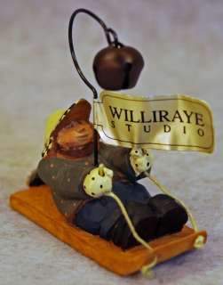   BOY ON SLED WITH BELL TREE ORNAMENT WW2617   GREEN COAT  