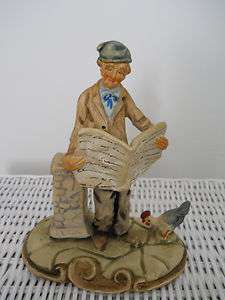 PORTUGESE POTTERY FIGURINE OLD MAN READING A NEWSPAPER  