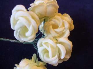   yellow (12) organdy flowers with pale yellow stamens in the center of