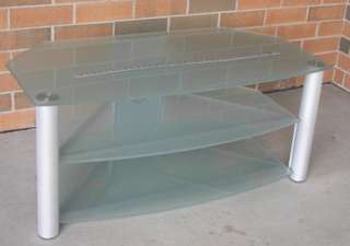 Line Design 3 Shelf Aluminum & Glass TV stand is sure to blend in 