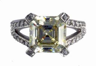 gold cubic zirconia pave set ring with a big asscher cut center stone 