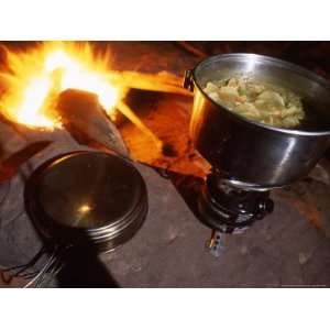  Split Pea Potato Soup Simmers on a Camp Stove Next to Camp 