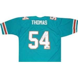  Autographed Zach Thomas Ball   (Jersey