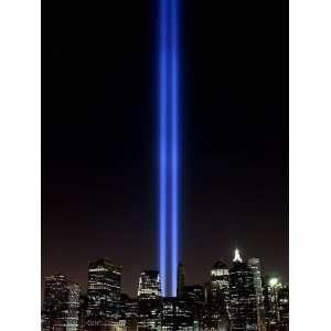 com The Tribute of Light Memorial Shines into the Sky Over the Night 